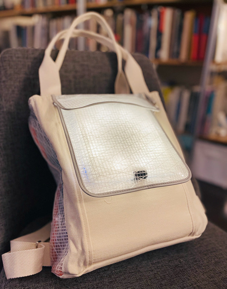 SolaPack backpack with light in front pocket.