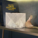 Load image into Gallery viewer, MEGAPUFF displayed on shelf as decorative solar light