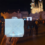 Load image into Gallery viewer, Petite white solar lantern for traveling in the city.