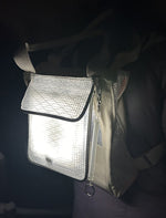 Load image into Gallery viewer, Backpack with keychain illuminated by solar lantern and power bank.