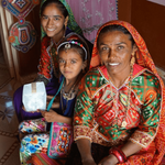 Load image into Gallery viewer, Give A Solar Light solar-lantern-donation-india-child and mother-disaster-relief-solight2.myshopify.com