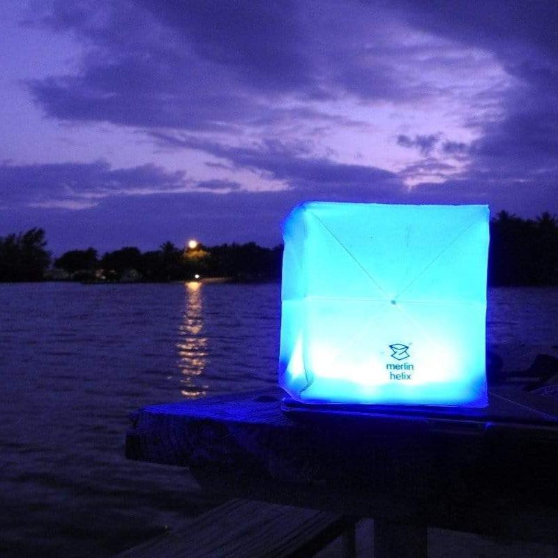 COLOR SOLAR LANTERNS - solar-lantern- outdoor-indoor-waterproof-this shows the blue light at a lake-Multipacks solight2.myshopify.com