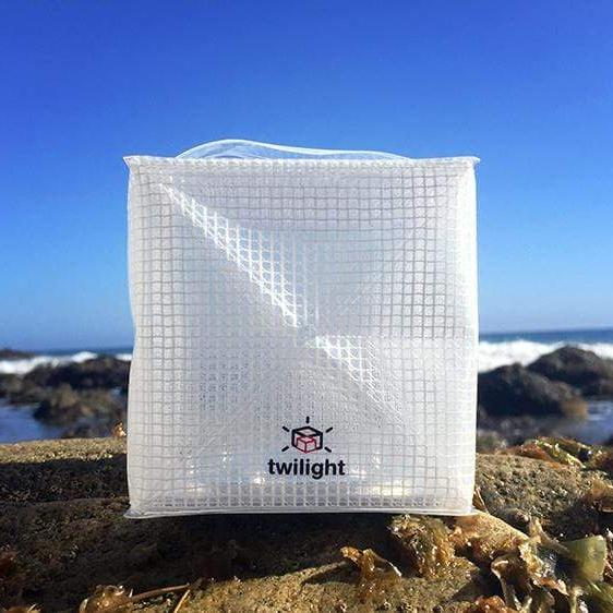 How happy does this make you fee? thiis solar lantern can go anywhere you do. it collapses flat and pops open into a happy cube of light. This shows solar lantern TWILIGHT on the ocean jetty. No fear it will get wet because it's waterproof and floats.