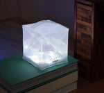 Load image into Gallery viewer, Twilight solar lantern shown here, you can form them into different shapes and flat-pack for when you are on the go. Comes in red light and white light all in one lantern.