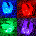 Load image into Gallery viewer, Four bright colors of SolarPuff lantern: blue, red, green, and purple.

