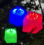 Load image into Gallery viewer, Solar lanterns with color array like capturing a rainbow inside a cube. Use for a chill color therapy session, or use for an outside stroll with your loved one. This solar lantern is perfect for parties and kids love them as night lights. Solar  lanterns can save you money on your energy bill too!
