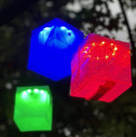 Load image into Gallery viewer, Solar lanterns with color array like capturing a rainbow inside a cube. Use for a chill color therapy session, or use for an outside stroll with your loved one. This solar lantern is perfect for parties and kids love them as night lights. Solar lanterns can save you money on your energy bill too!