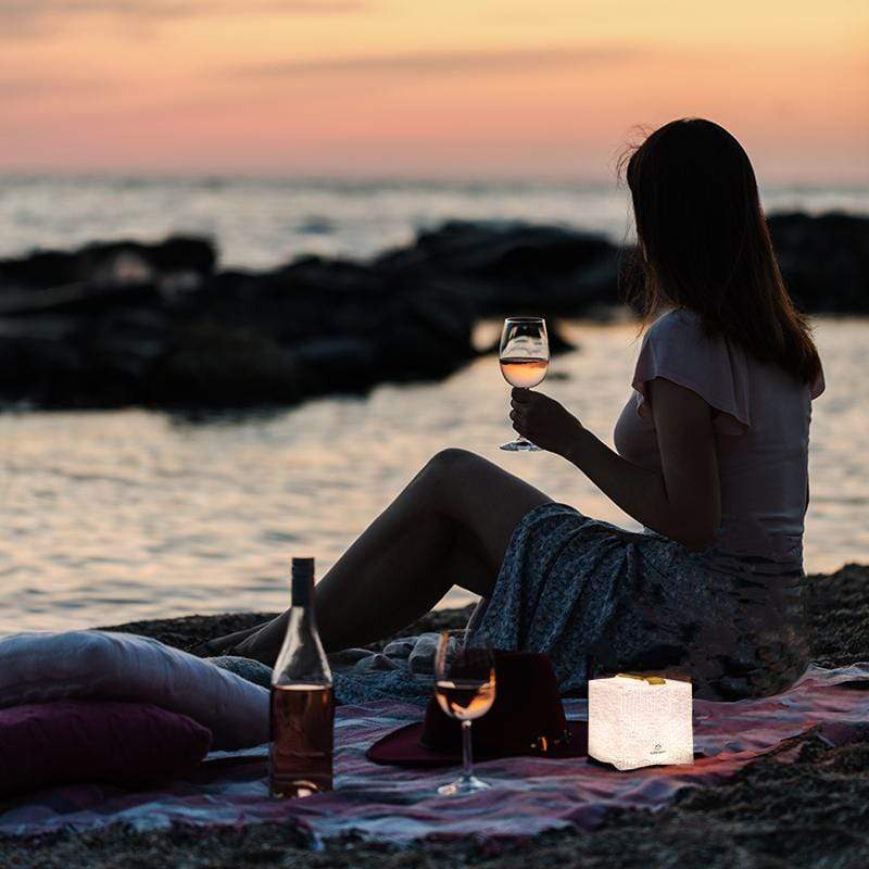 Evening picnic with solar lantern, wine and solarpuff.