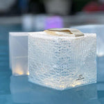 Load image into Gallery viewer, Multiple SolarPuff waterproof lanterns floating in pool at night