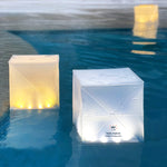 Load image into Gallery viewer, Helix Hybrid solar lanterns in pool glowing in warm and bright light modes

