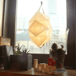 Load image into Gallery viewer, SOLAR LANTERN AND MOBILE CHARGER This shows the QWNN open half way and hangin in the window. it will charge itself all day when ther&#39;s sun. and you can use it as room lighting when the sun goes down. solight2.myshopify.com
