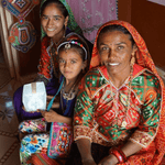 Load image into Gallery viewer, Give A Solar Light solar-lantern-donation-india-child and mother-disaster-relief-solight2.myshopify.com
