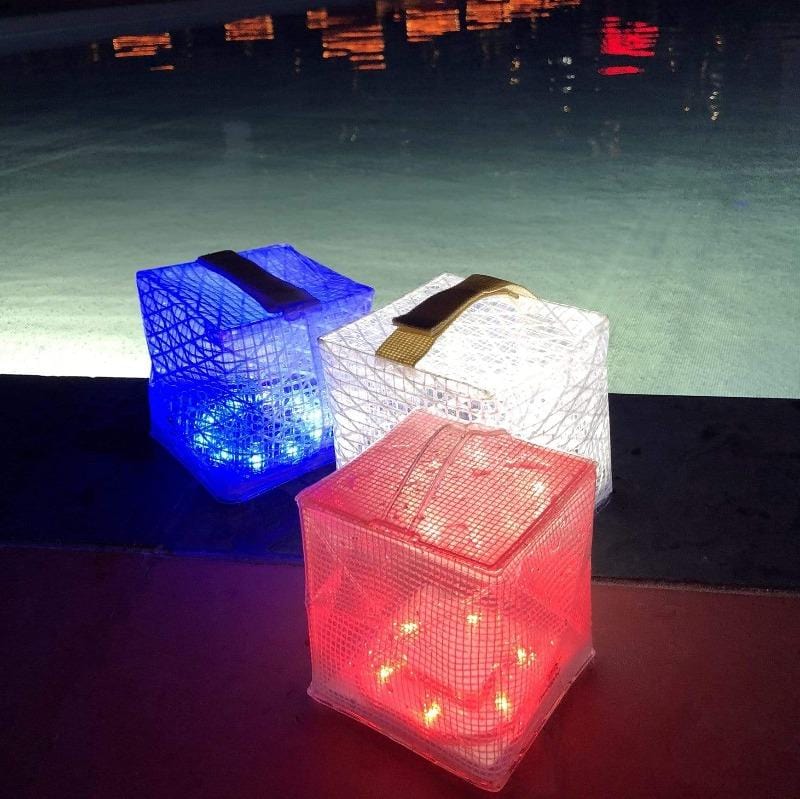 Pool lanterns here are in red, white and blue. Waterproof and floats for a beautiful pool ambiance.