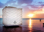 Load image into Gallery viewer, SOLAR LANTERN here is about to see the sun set off the coast of Dominica. The SolarPuff makes a beautiful spectum of light with it&#39;s special sail cloth material. It has light sensor-perfect light for evening parties or fun our doors. Take on your next camping trip or just hang in your garden.solight2.myshopify.com
