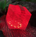 Load image into Gallery viewer, Here Solar Lanterns can be used in your garden. Shown here in  Red Light, but you can change the color any time or use on auto rotate setting and it will be a rain bow of colors  that change on it&#39;s own. 

