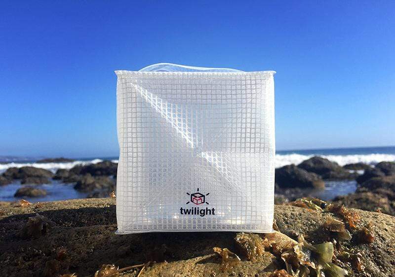 How happy does this make you fee? thiis solar lantern can go anywhere you do. it collapses flat and pops open into a happy cube of light. This shows solar lantern TWILIGHT on the ocean jetty. No fear it will get wet because it's waterproof and floats.