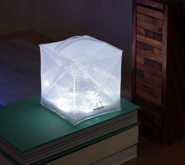 Twilight solar lantern shown here, you can form them into different shapes and flat-pack for when you are on the go. Comes in red light and white light all in one lantern.