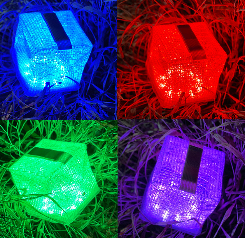 Four bright colors of SolarPuff lantern: blue, red, green, and purple.