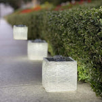 Load image into Gallery viewer, Solar garden Lights will brighten your yard or porch with beautiful ambiance. Here we see the green grass lit up with solar lantern solarpuff and helix.
