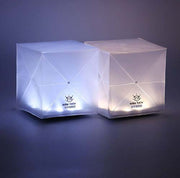 Studio photo of Helix Hybrid lanterns showing warm and bright white light modes