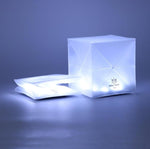 Load image into Gallery viewer, Helix solar lanterns in bright mode, shown both folded and fully expanded
