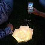 Load image into Gallery viewer, QWNN lantern charging phone outdoors at night, two people on grass
