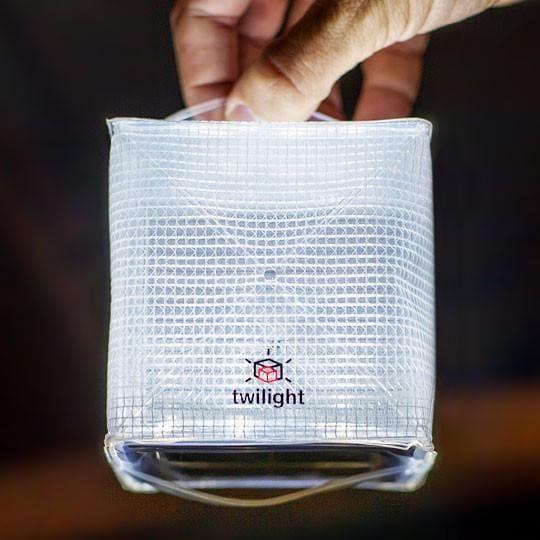 solar-lantern- red- camping-emergency- light- small and compact- flat packs for easy travel.